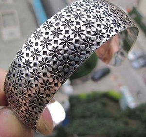 Tibetan-Style Silver Totem Bangle – Unisex Ethnic Cuff