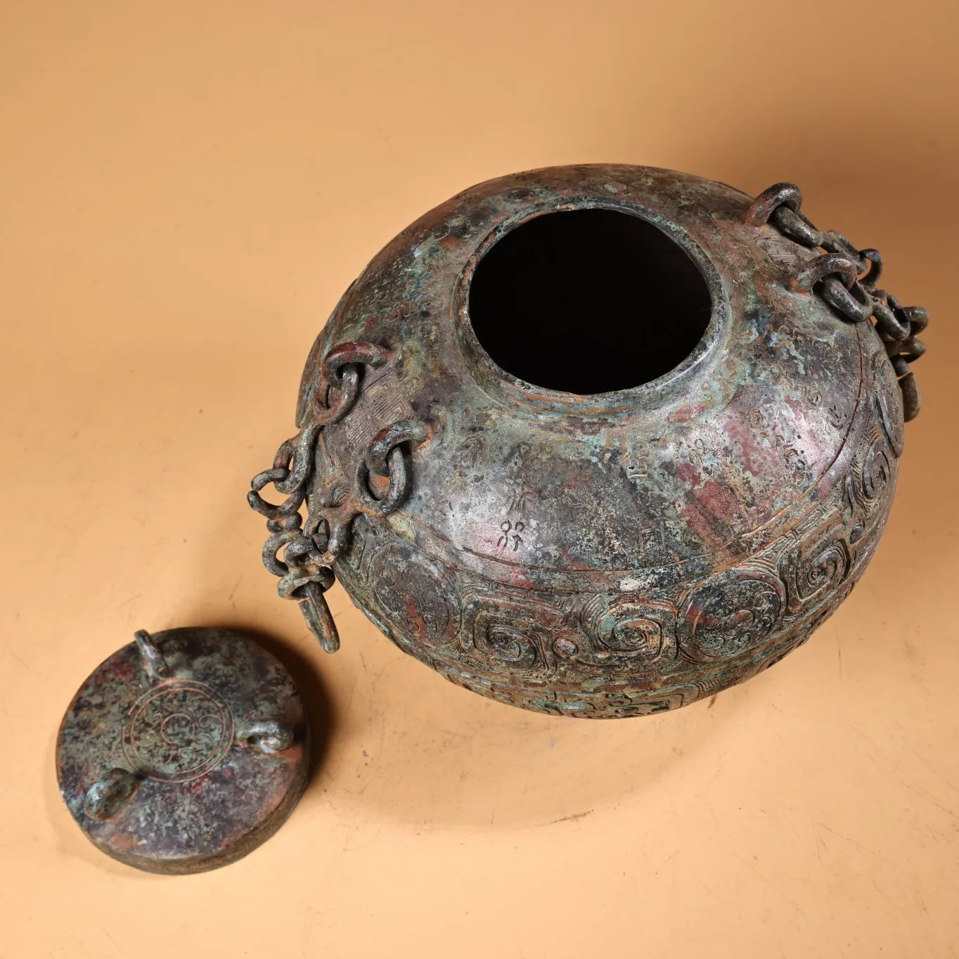 Tibetan Temple Bronze Beam-Handled Jar – Verdigris & Cinnabar Beast-Head Pot (7")
