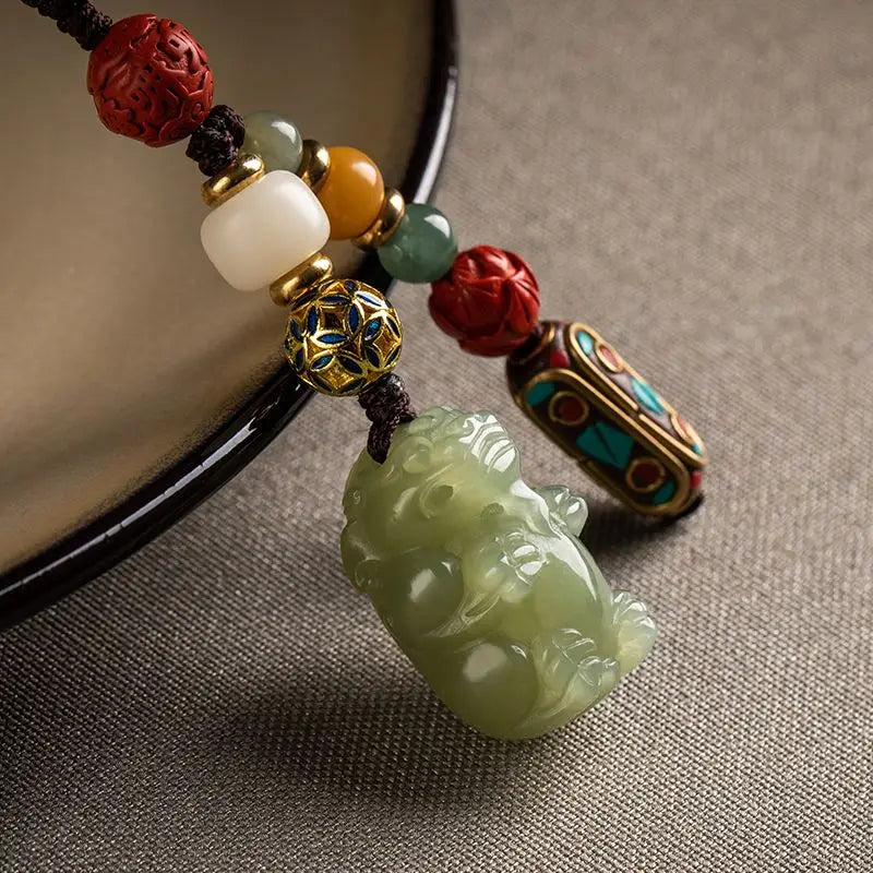 Pure hand-carved Hetian jade pendant Pixiu car keychain male simple female natal year gift