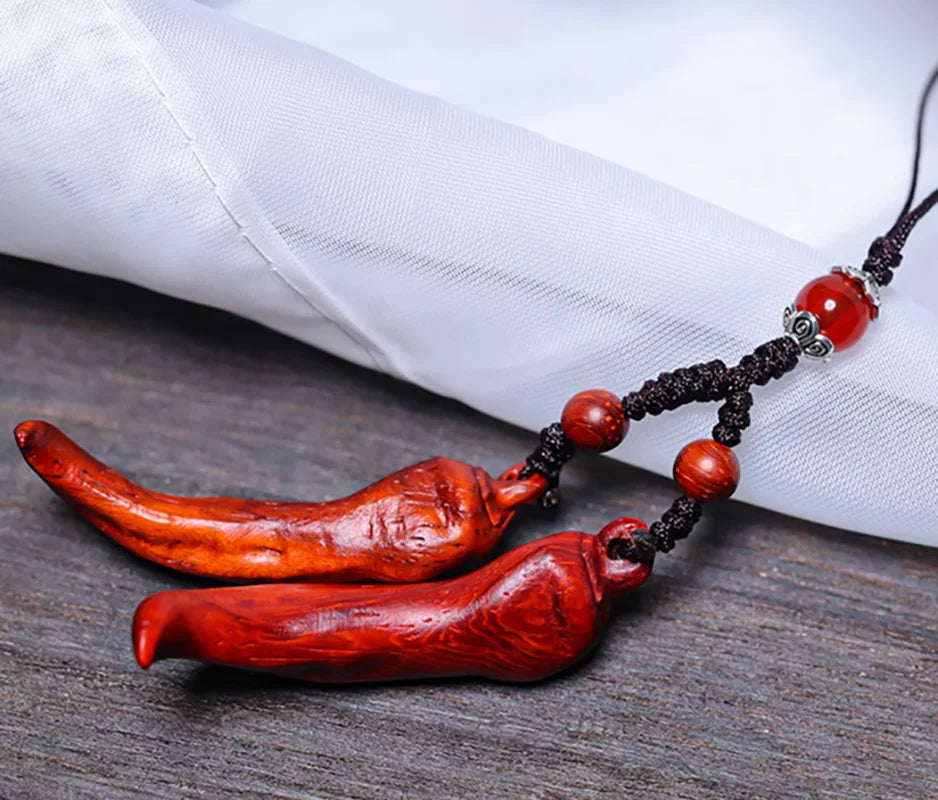 Pfeffer-Rosenholz-Netsuke-Perle – Kleine geschnitzte Figuren-Anhänger 5,5 cm